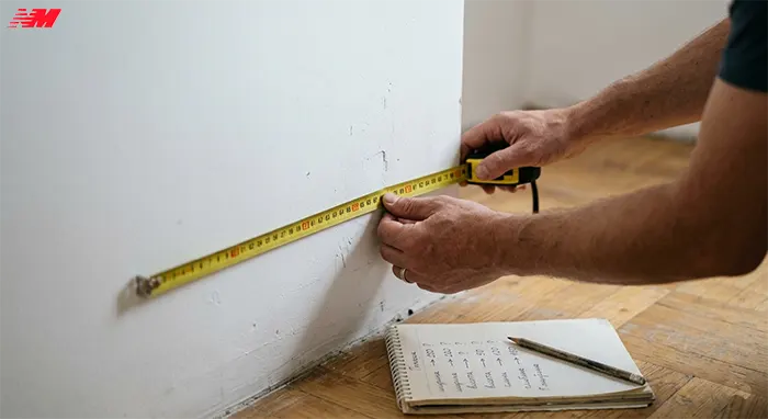 Вимірювання стіни перед замовленням шафи-купе — як уникнути помилок при замірах